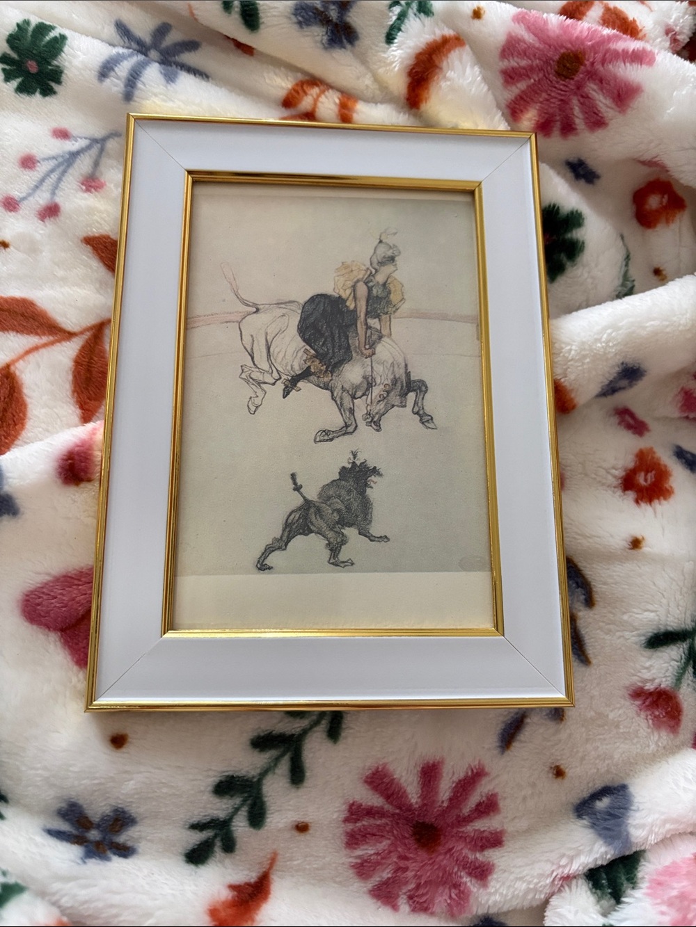 White and Gold Framed Artwork